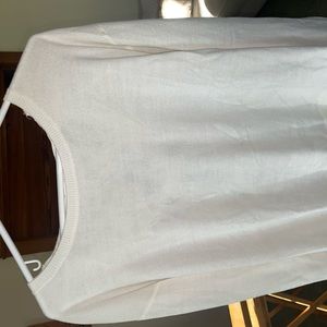 white maurice’s sweater